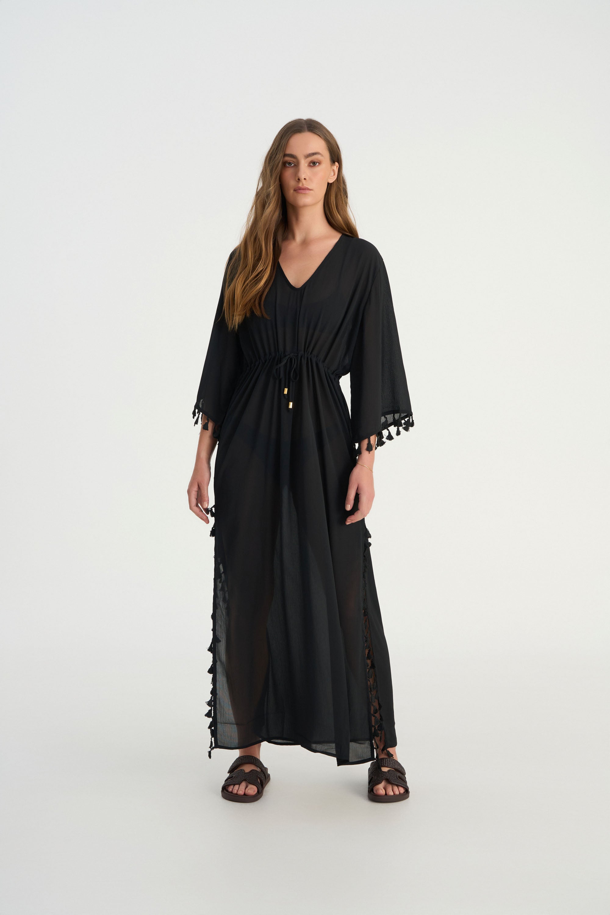 FLUER luxury kaftan styled as an elegant beach cover up and resort wear piece