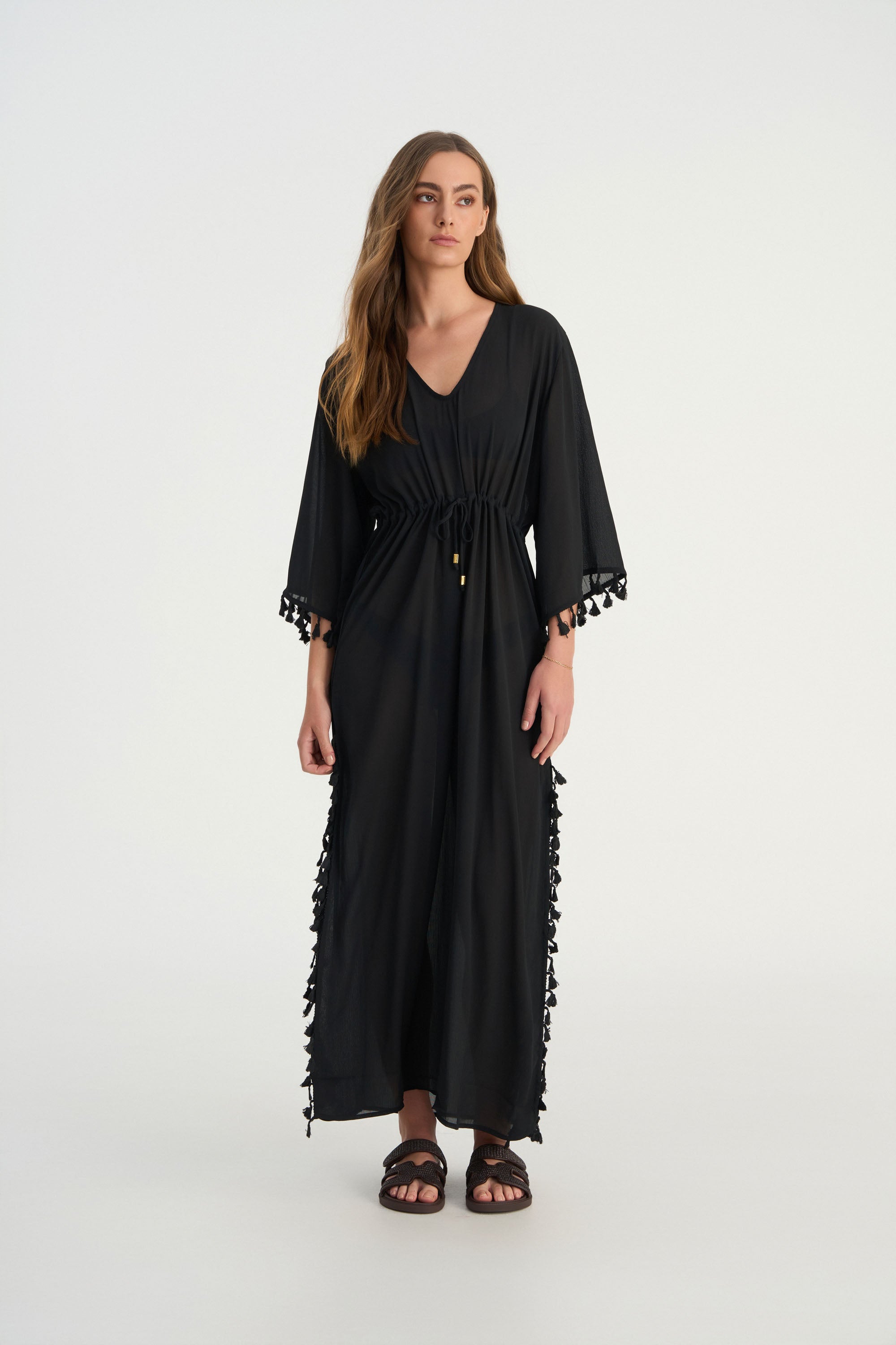 FLUER luxury kaftan styled as an elegant beach cover up and resort wear piece