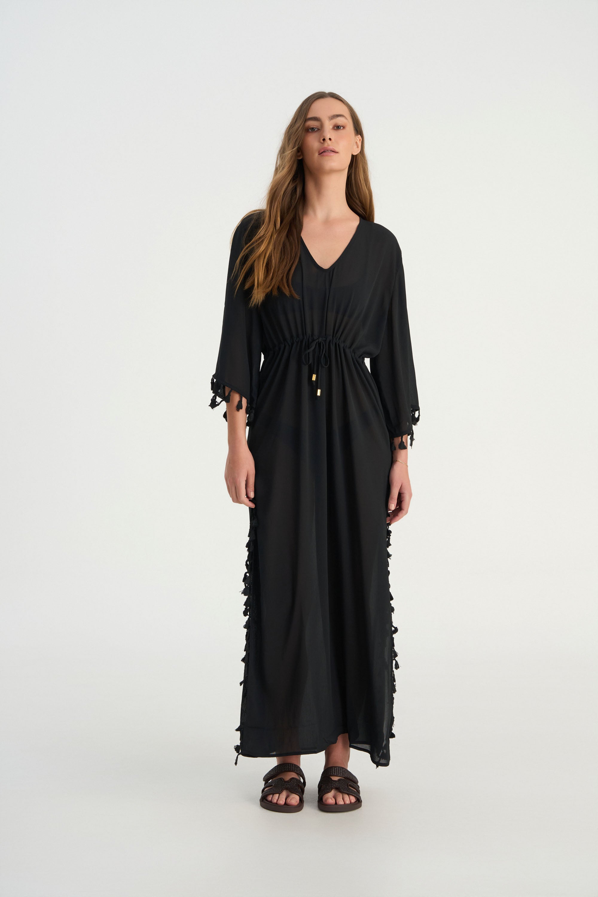 FLUER luxury kaftan styled as an elegant beach cover up and resort wear piece
