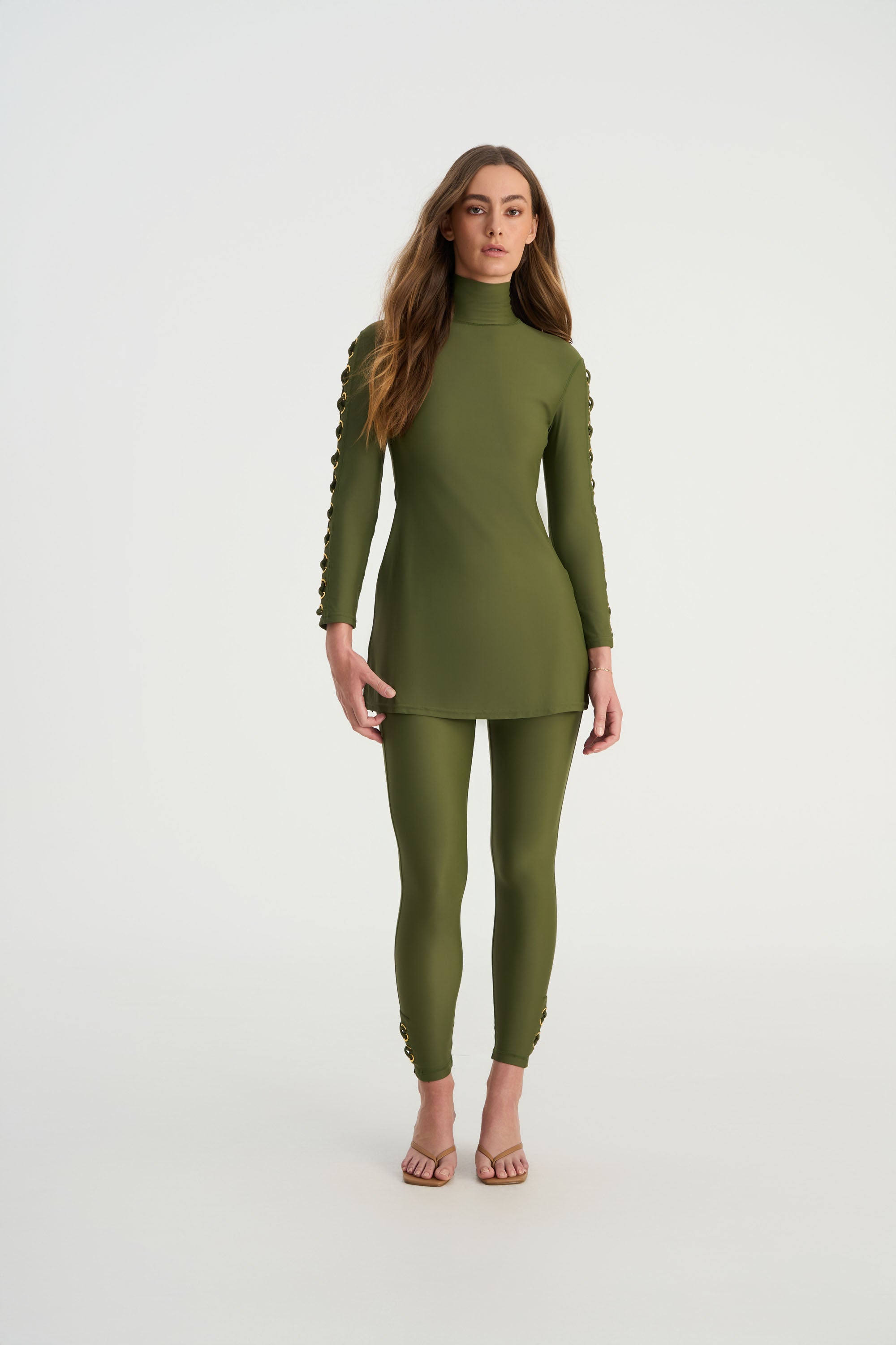 Front view of CEMILE black luxury swim leggings with UPF50+ sun protection and full-length coverage