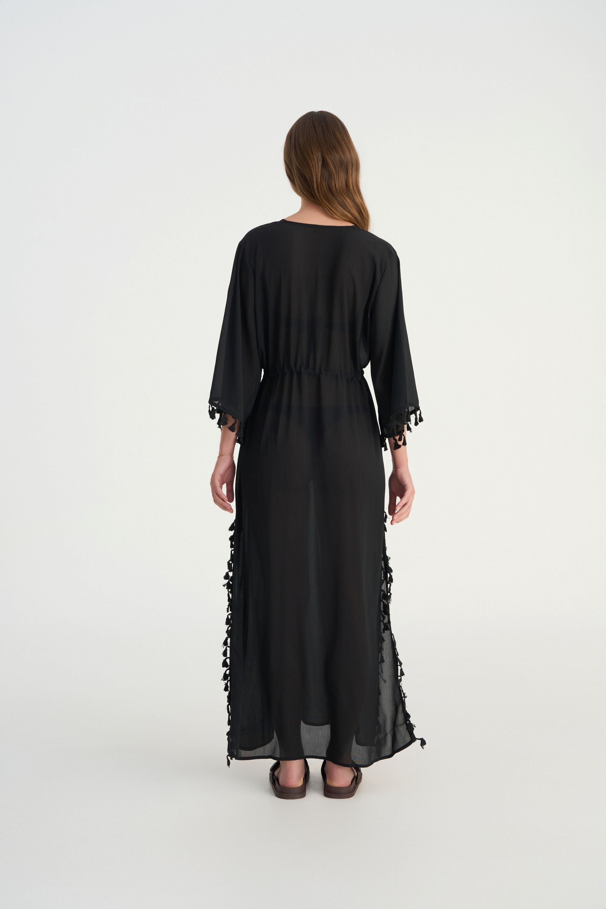 Back view of FLUER luxury resort wear kaftan designed for effortless vacation dressing