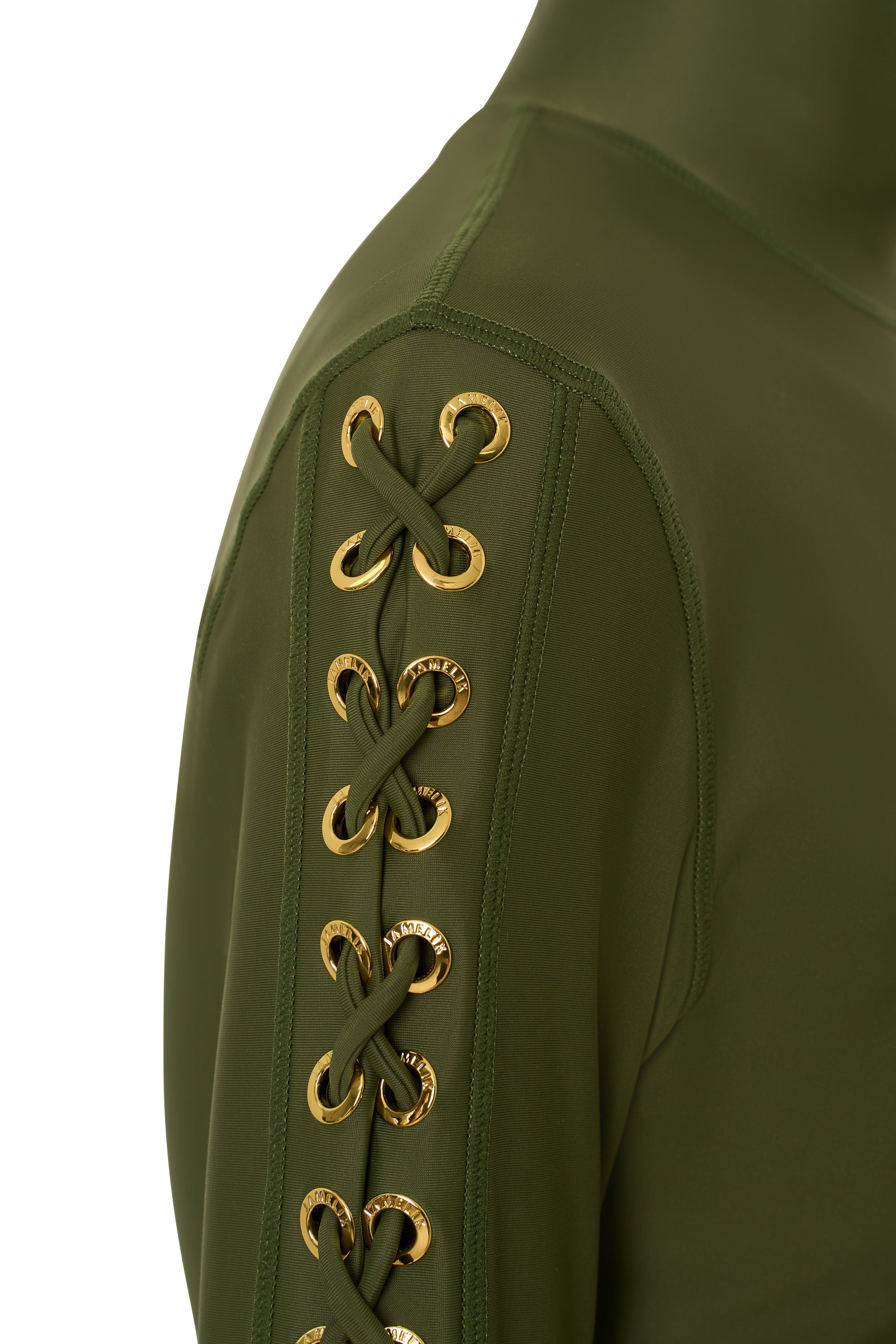 Hand-finished eyelet detailing on the sleeve of the JAMILA luxury swim tunic