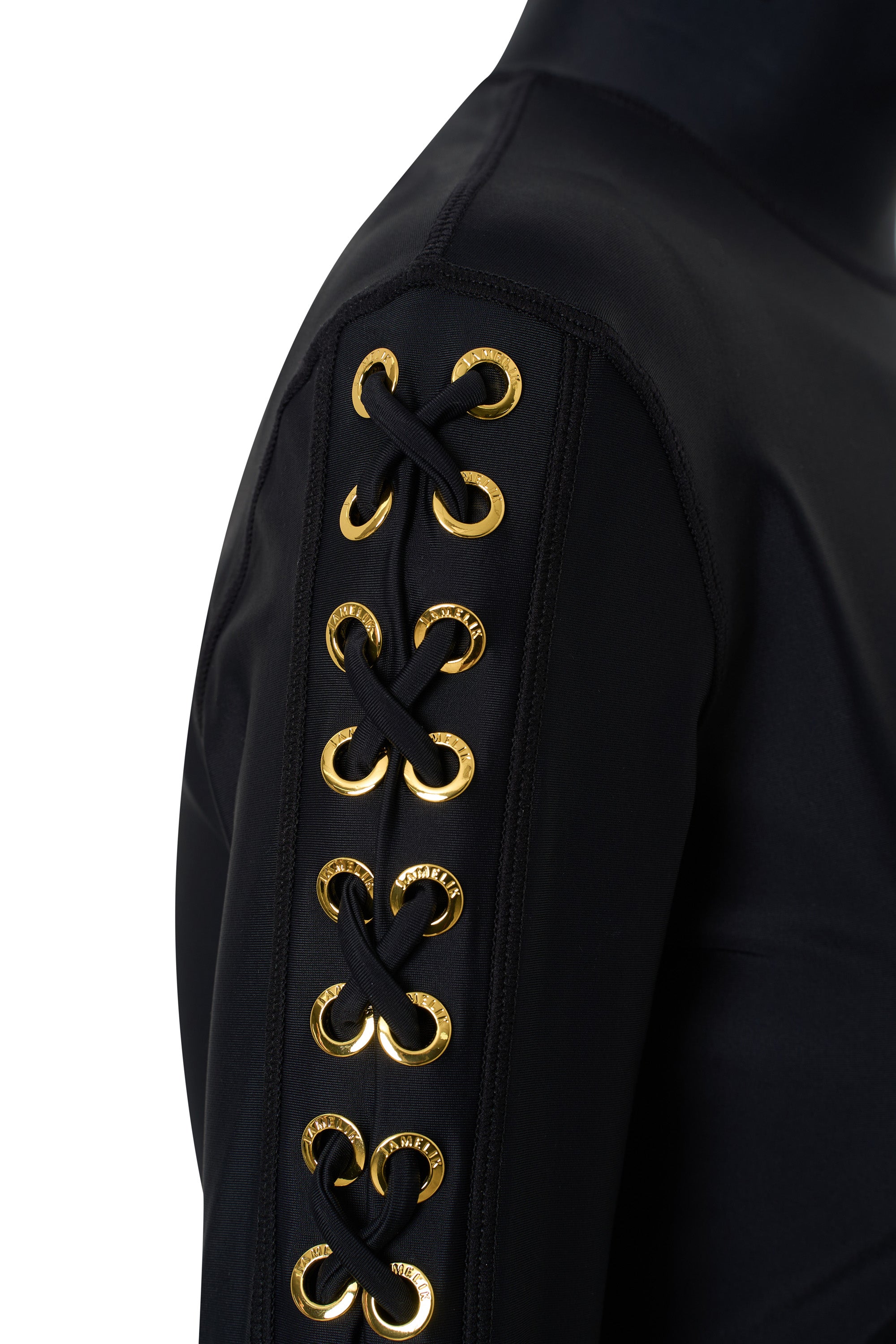 Hand-finished eyelet detailing on the sleeve of the JAMILA luxury swim tunic